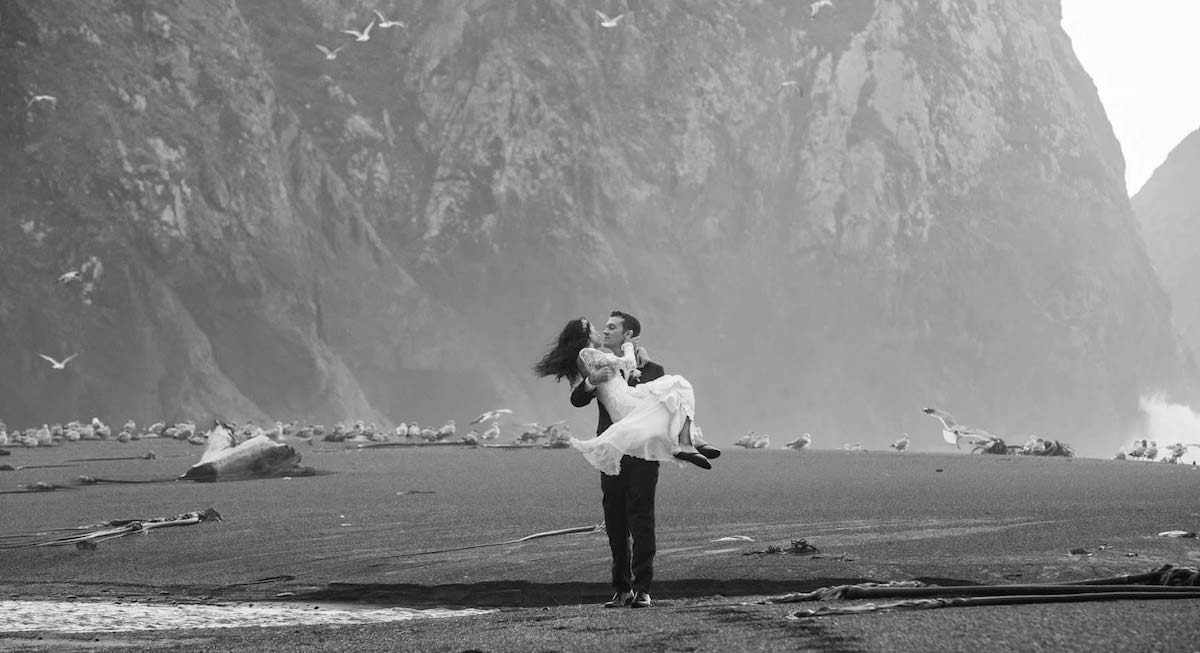 Elk Cove Inn bride and groom on beach